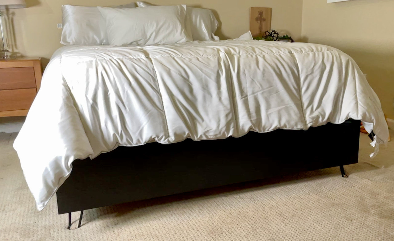 How to DIY a mid century bed frame with hair pin legs using scrap materials.