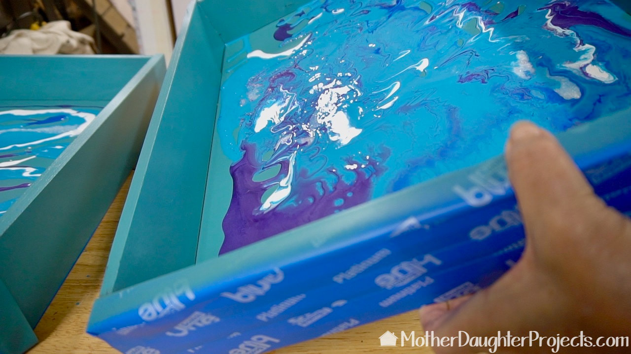 Using DecoArt paints to paint pour the inside of the desk drawers. 