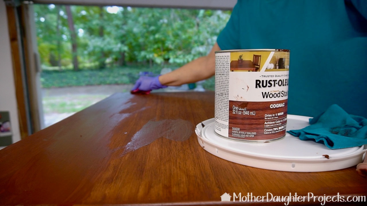 Staining the desk with Rust-Oleum wood stain in Cognac.