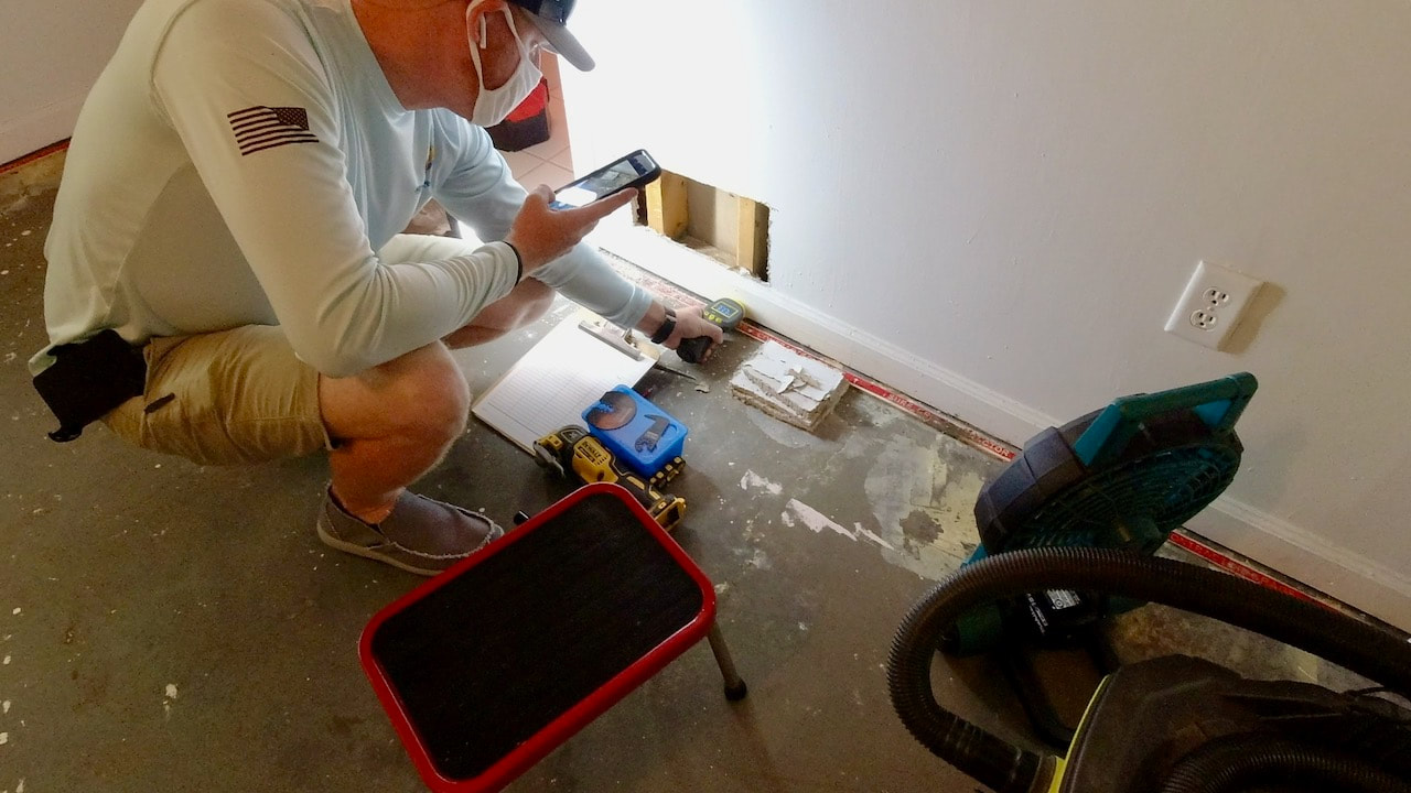 When the bottom of the drywall was tested for moisture, it was 100%.