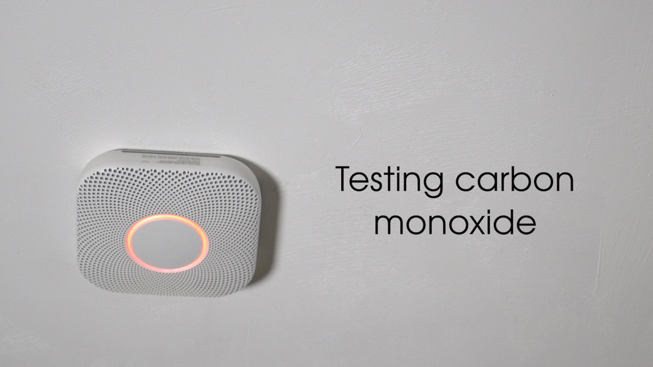 Testing the alarm feature of the carbon monoxide detector on the Google Nest Protect.