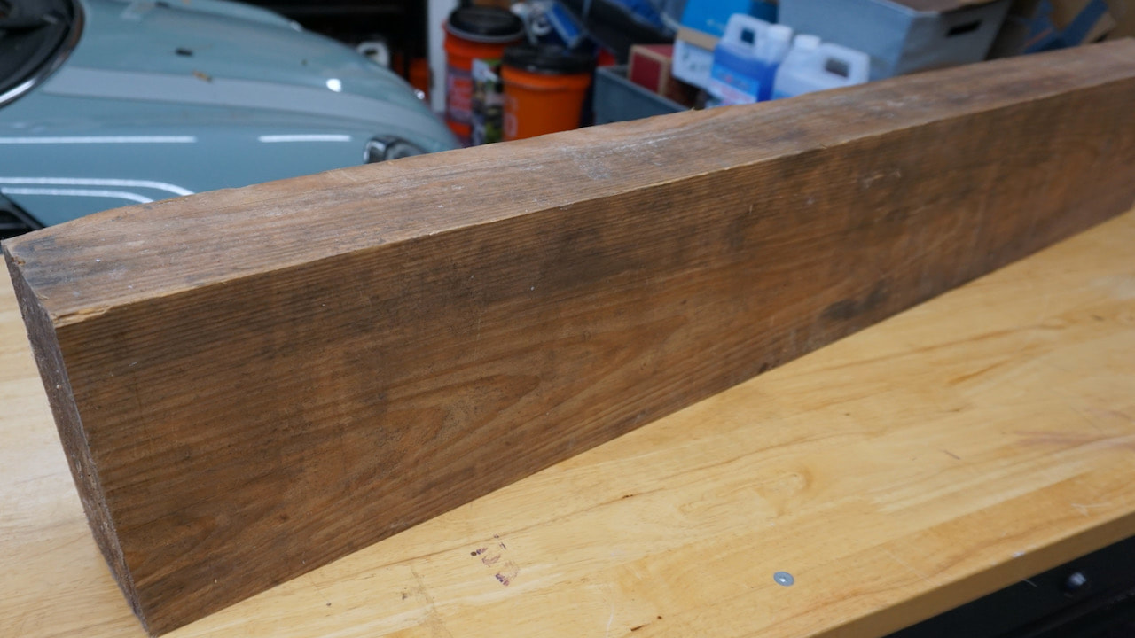 We used a large beam of old pine for the base of the footstool.