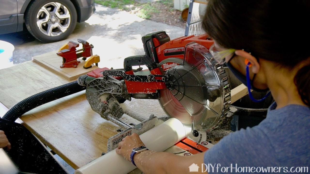 M18 FUEL 18-Volt Lithium-Ion Brushless Cordless 10 in. Dual Bevel Sliding Compound Miter Saw in use.