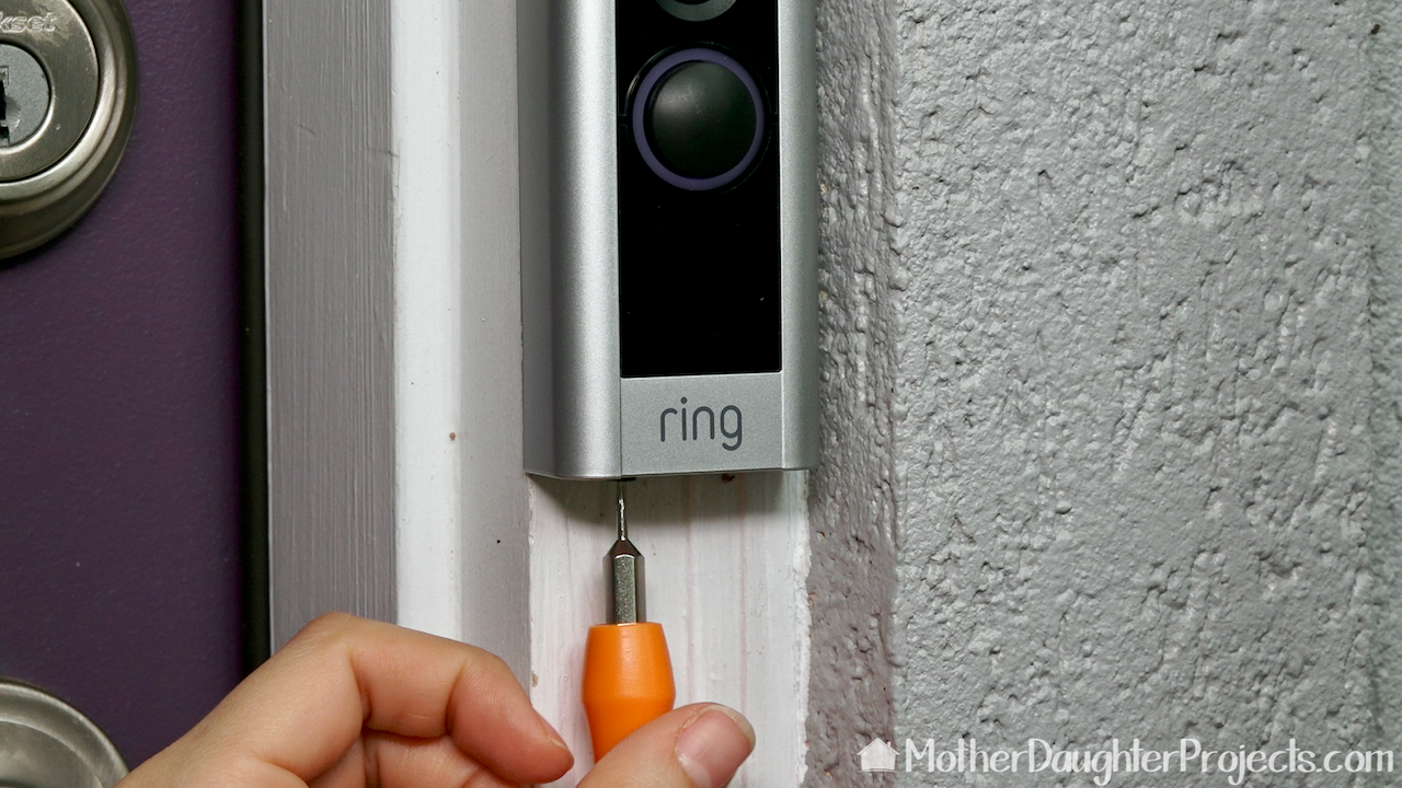 Install the Ring security screw on the bottom of the faceplate. 