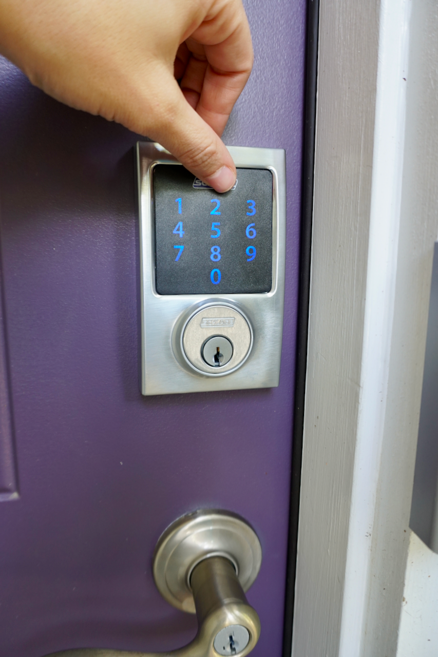 Touch the Schlage logo to lock. A green check will appear to confirm. 
