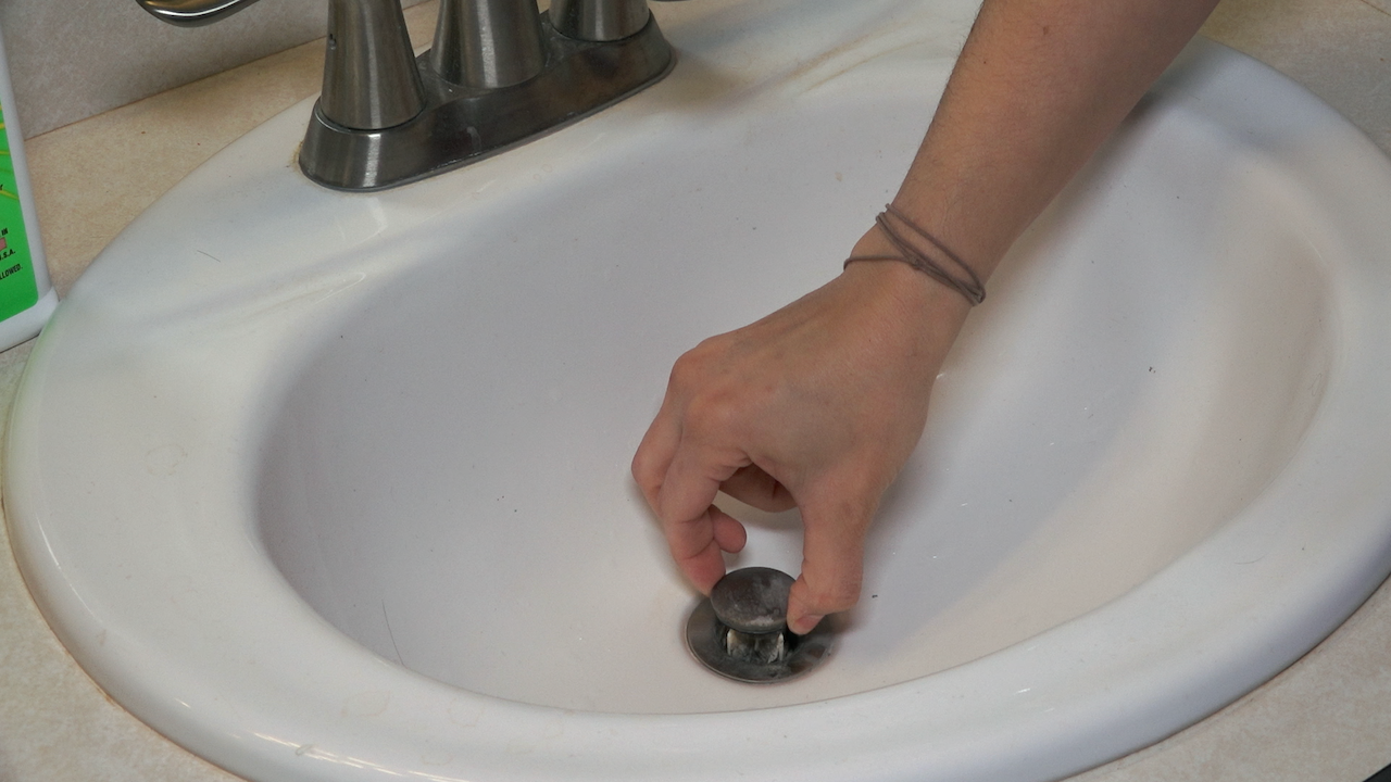 Remove the sink stopper prior to cleaning the drain.