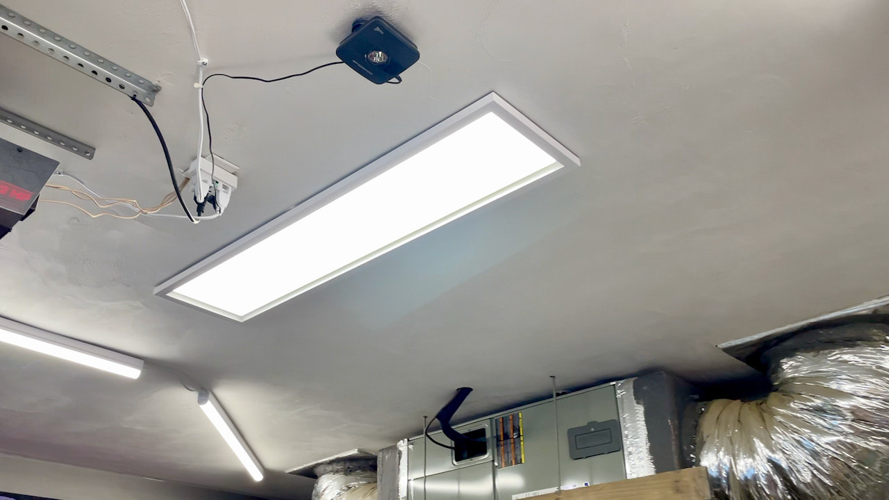 We installed a skylight LED panel from Costco to replace the existing fixture.