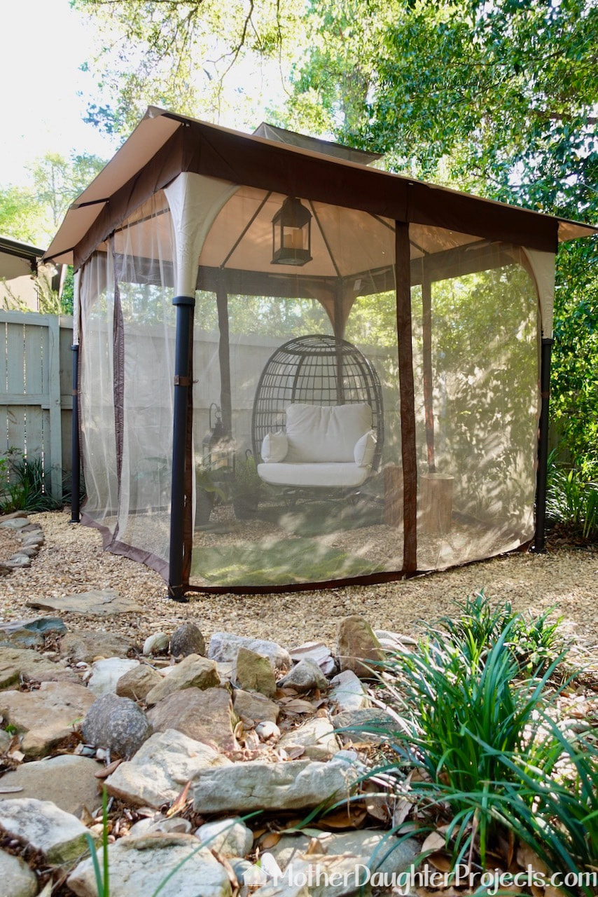 The netting on the Sunjoy gazebo can be zipped up to protect from flying bugs like mosquitos.