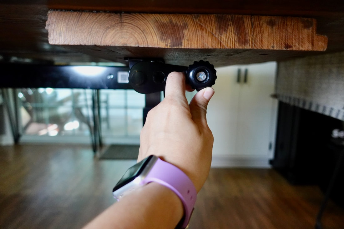 With the table overhang, the Husky crank to adjust the table could not be used. 