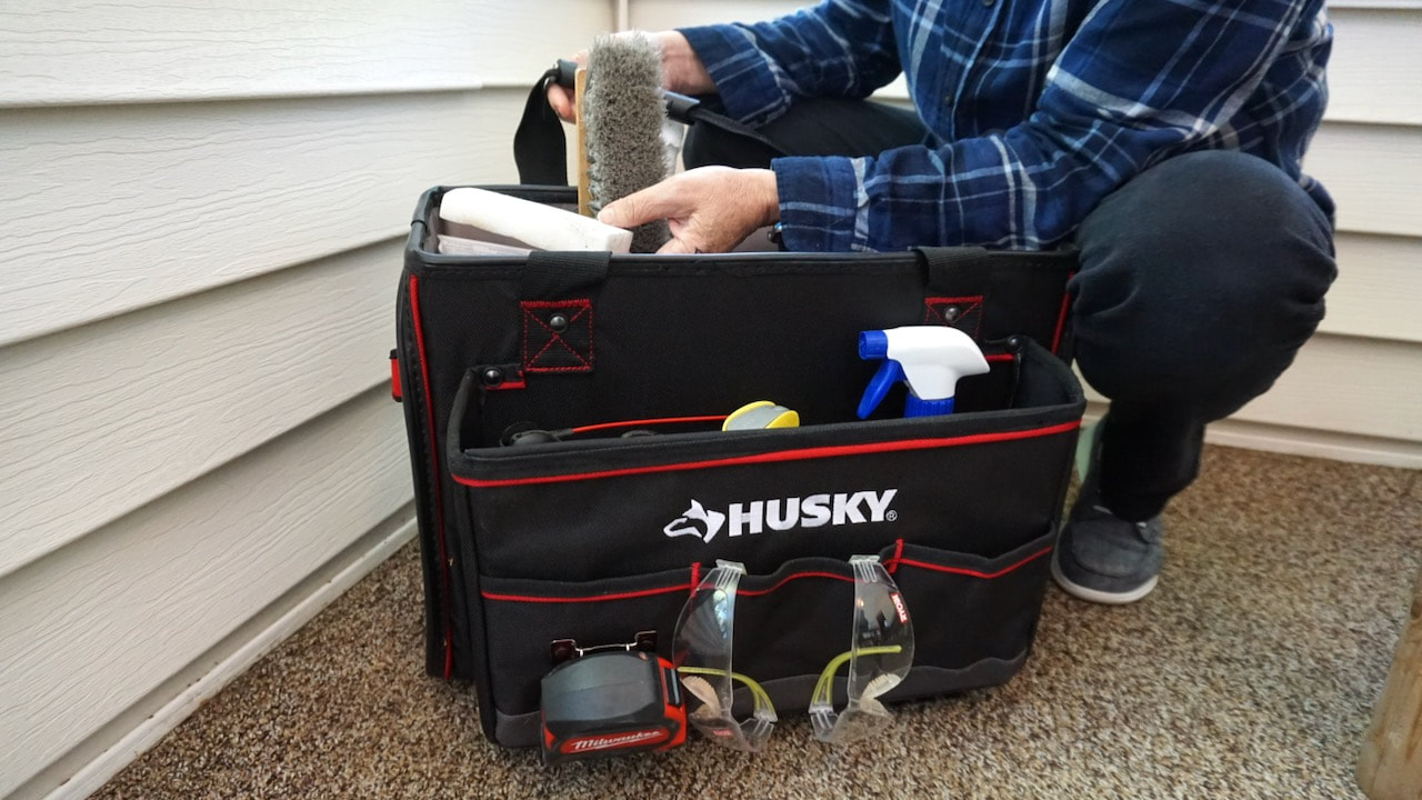 Husky tool tote has lots of pockets for tool storage.