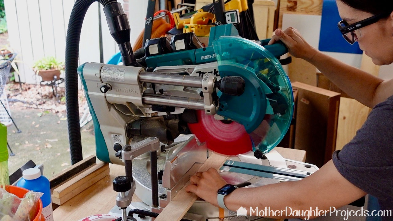 Here we are cutting the box pieces to size on a Makita battery powered miter saw. 