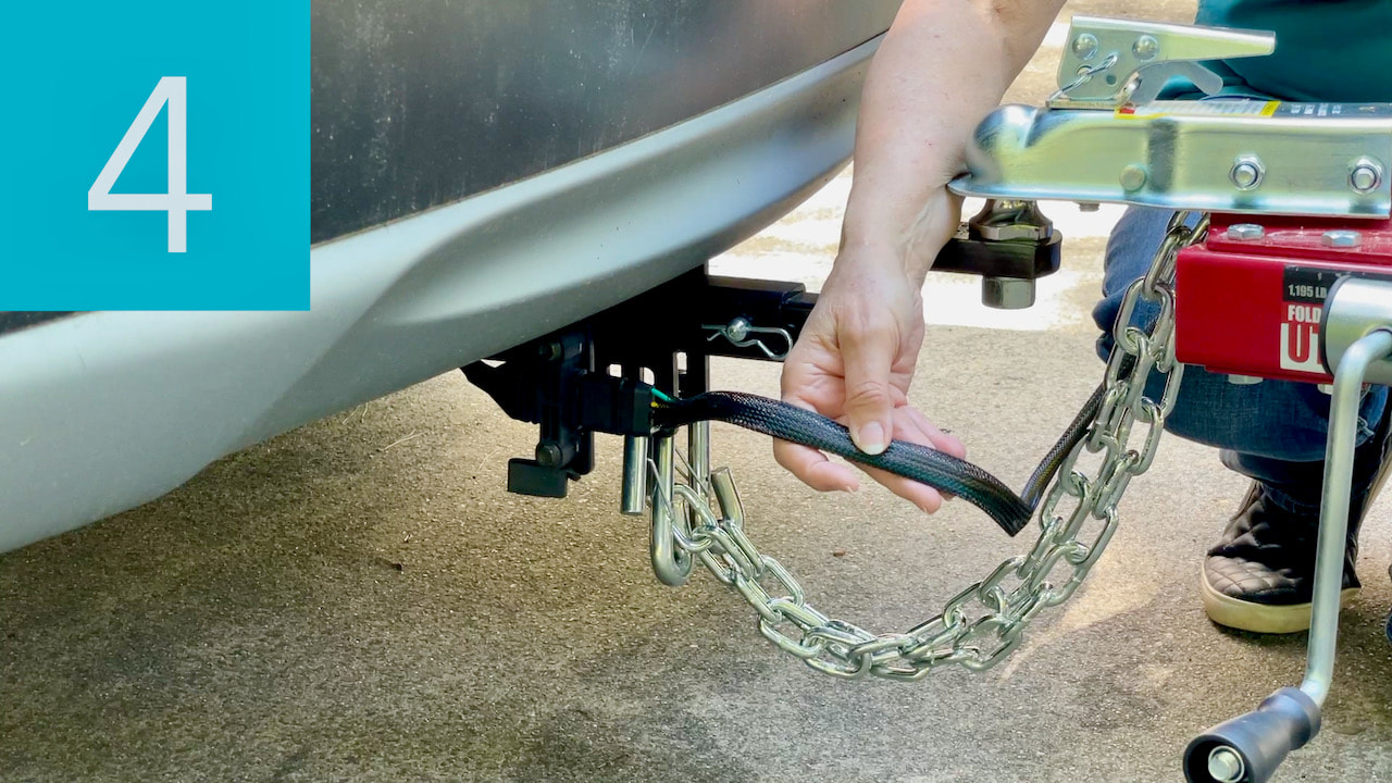 Be sure all the trailer wiring is securely attached to the tow vehicle.