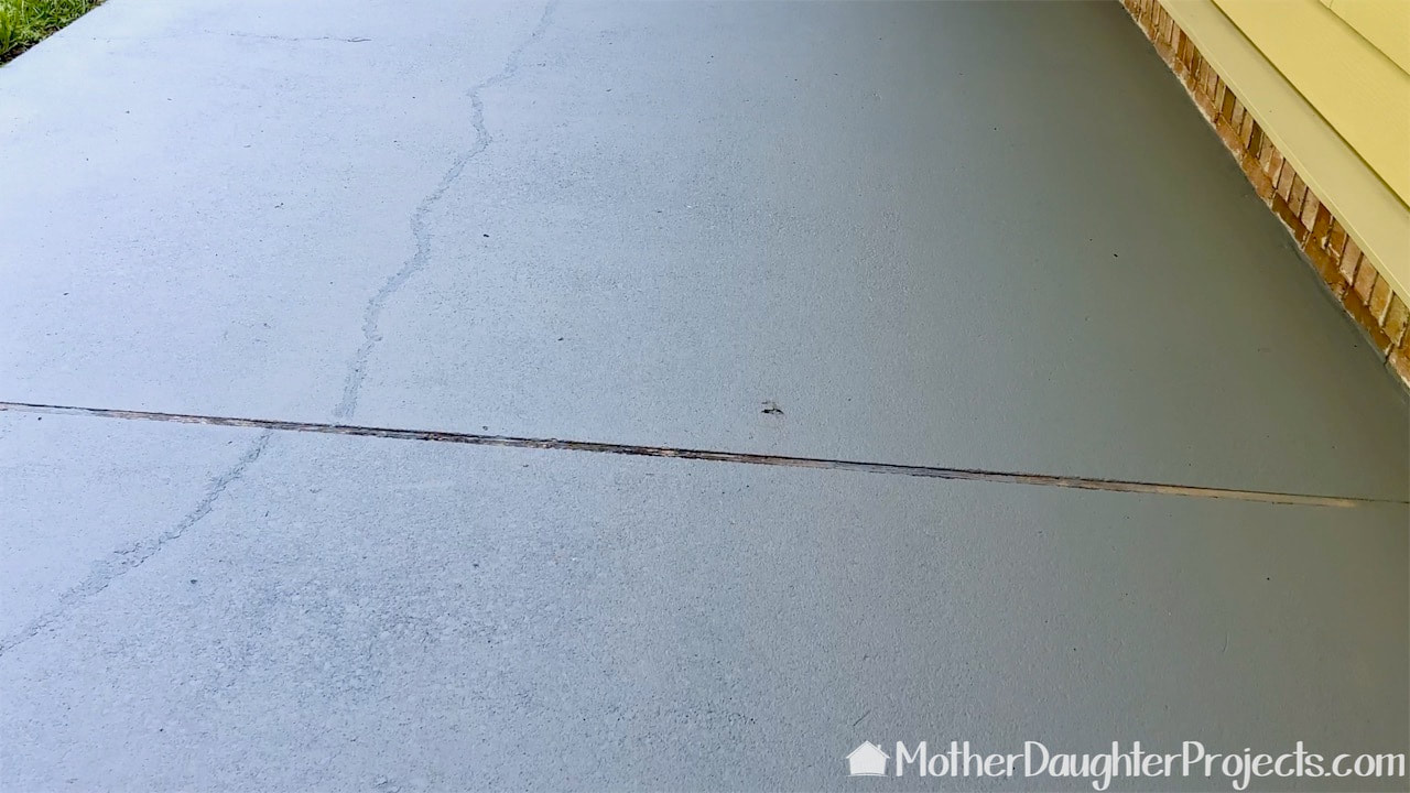 How to remove the old wood expansion joint from a concrete slab.