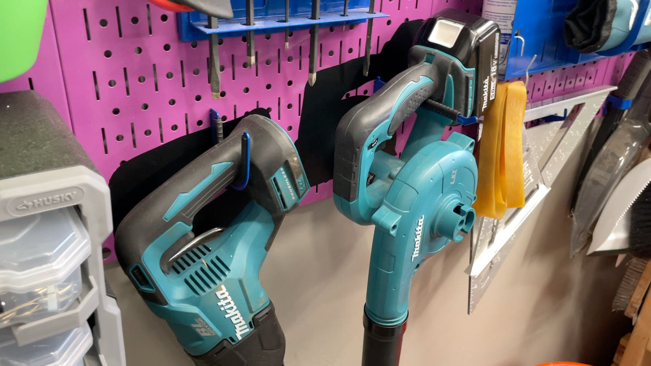 The flexible trim securely holding a couple of Makita tools. 