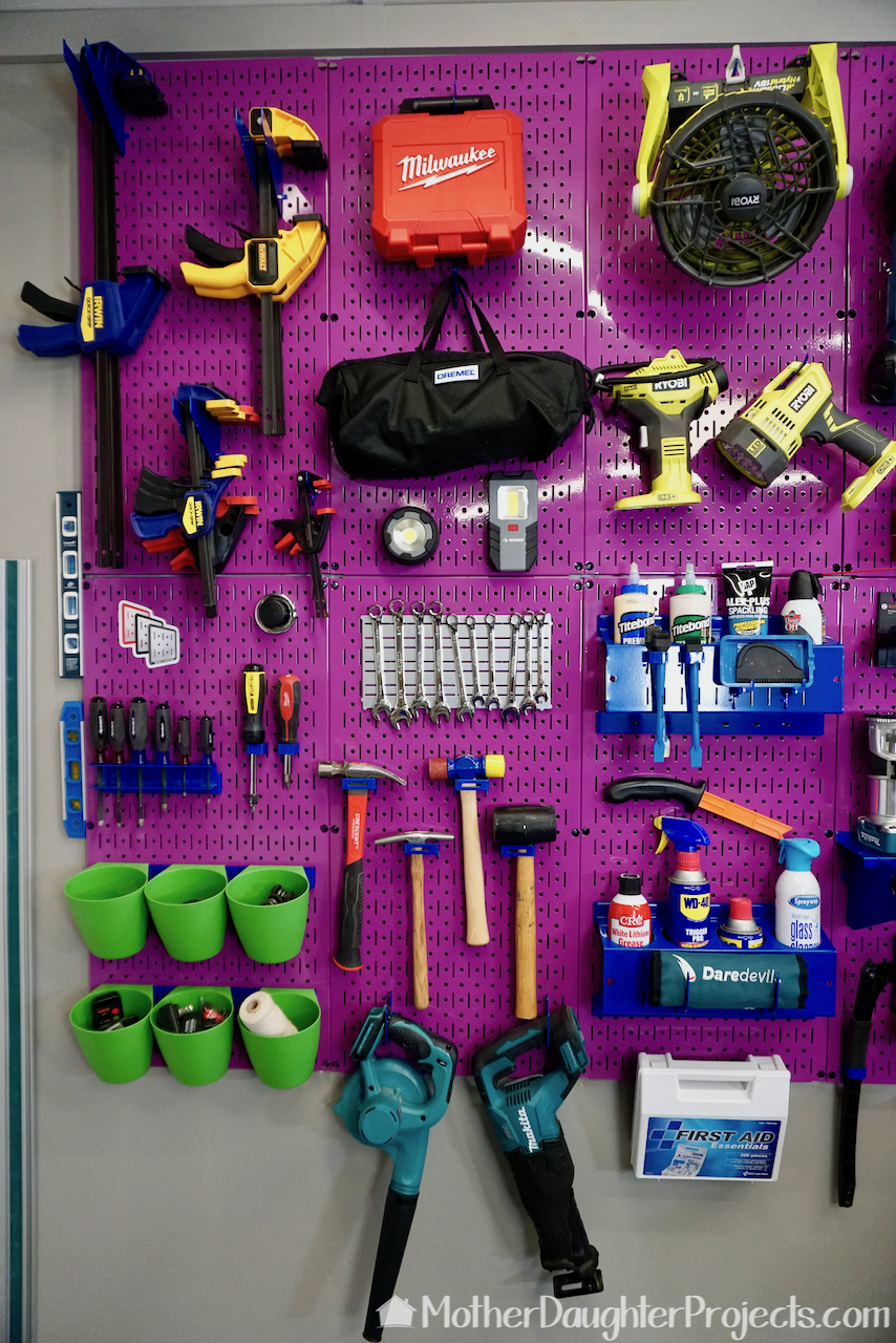 Video tutorial! Watch how to install and organize purple pegboard! Organize all your tools and supplies with hooks and metal shelves. #wallcontrol #metal #thdprospective