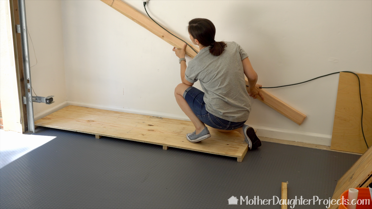 Determining placement of the wood storage divider.