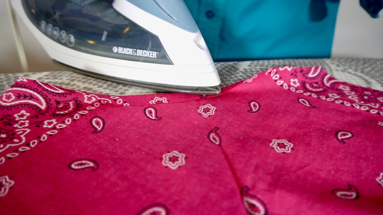 Be sure to press down this edge prior to sewing the DIY bandana. 