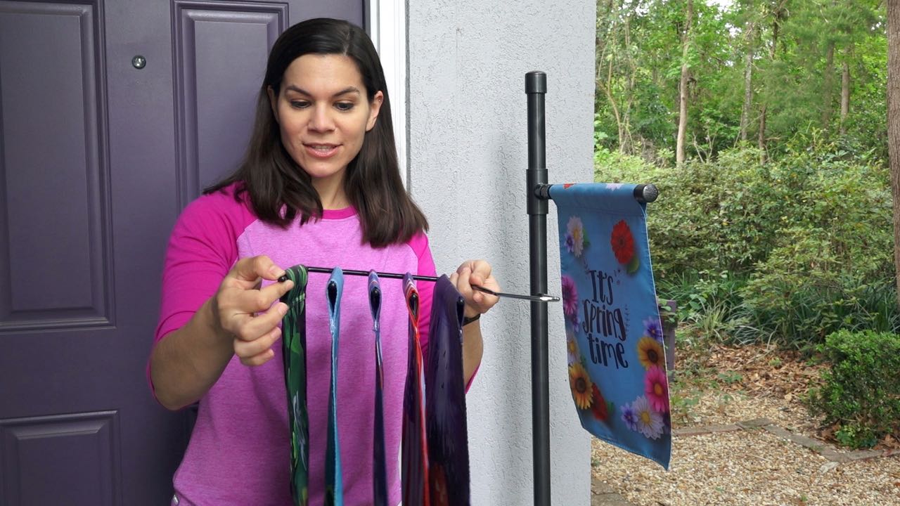 How to store your garden flags with a pant hanger. 