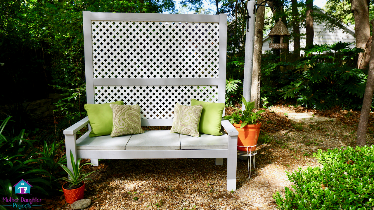 Learn how to customize an Ana White bench plan to make a backyard garden privacy screen with concrete seat.