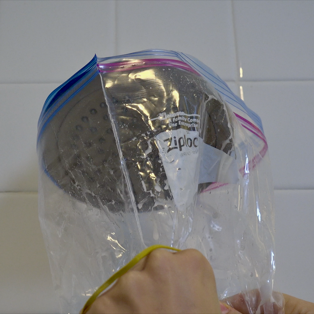 Learn how to clean mineral deposits from a showerhead with vinegar and how to get each nozzle working!