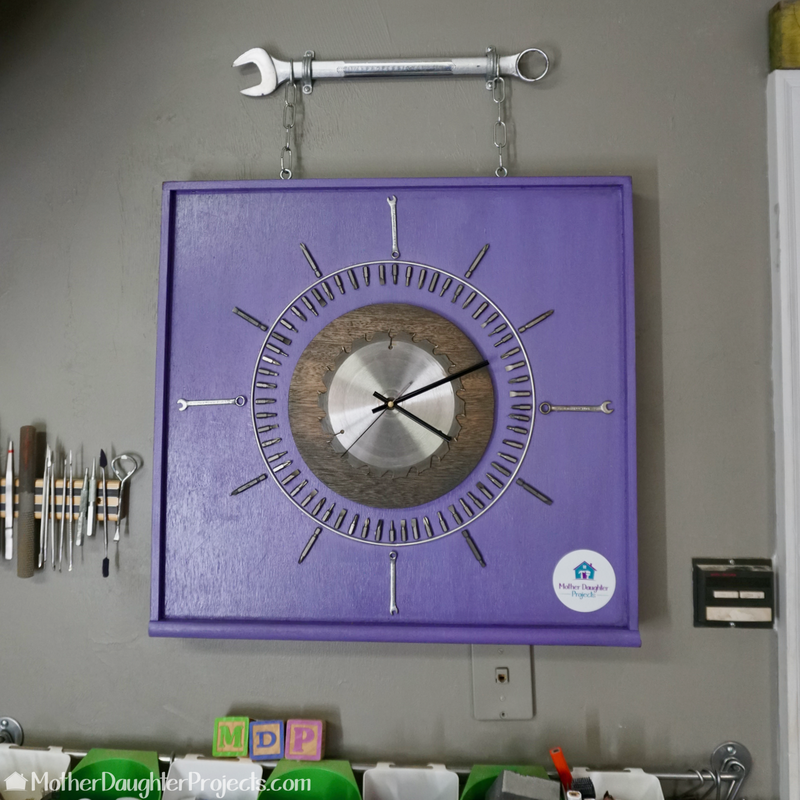 Learn how to use old driver bits, wrenches, saw blades, and more to make a shop clock perfect for a garage!