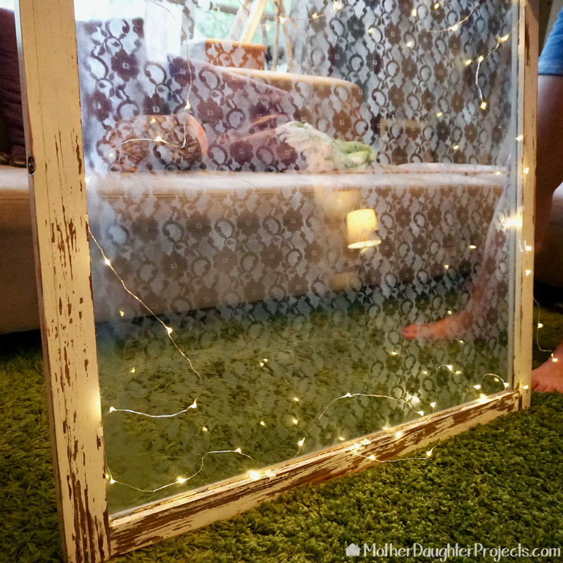 Learn how to repurpose and reuse old windows. See how to use lace as a stencil for a subtle and beautiful effect. See how to hang them with French cleats and get some ideas on how to use the panes in your living room!