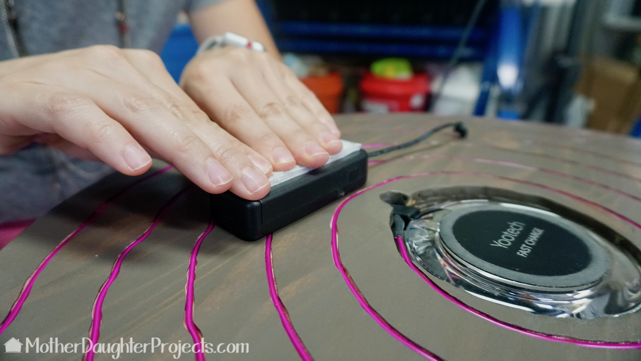 Watch this DIY video on how to use el wire in a nightstand for a neon look! This is also a wireless charger for an Apple iPhone 8, 8+, or 10.